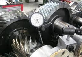 Gearbox components laid out after cleaning and inspection.