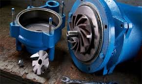 Pump disassembled for inspection; seal faces and bearing seats checked.