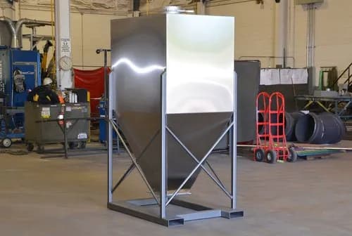 304 stainless hopper TIG-welded, ground, and brushed to match existing equipment.